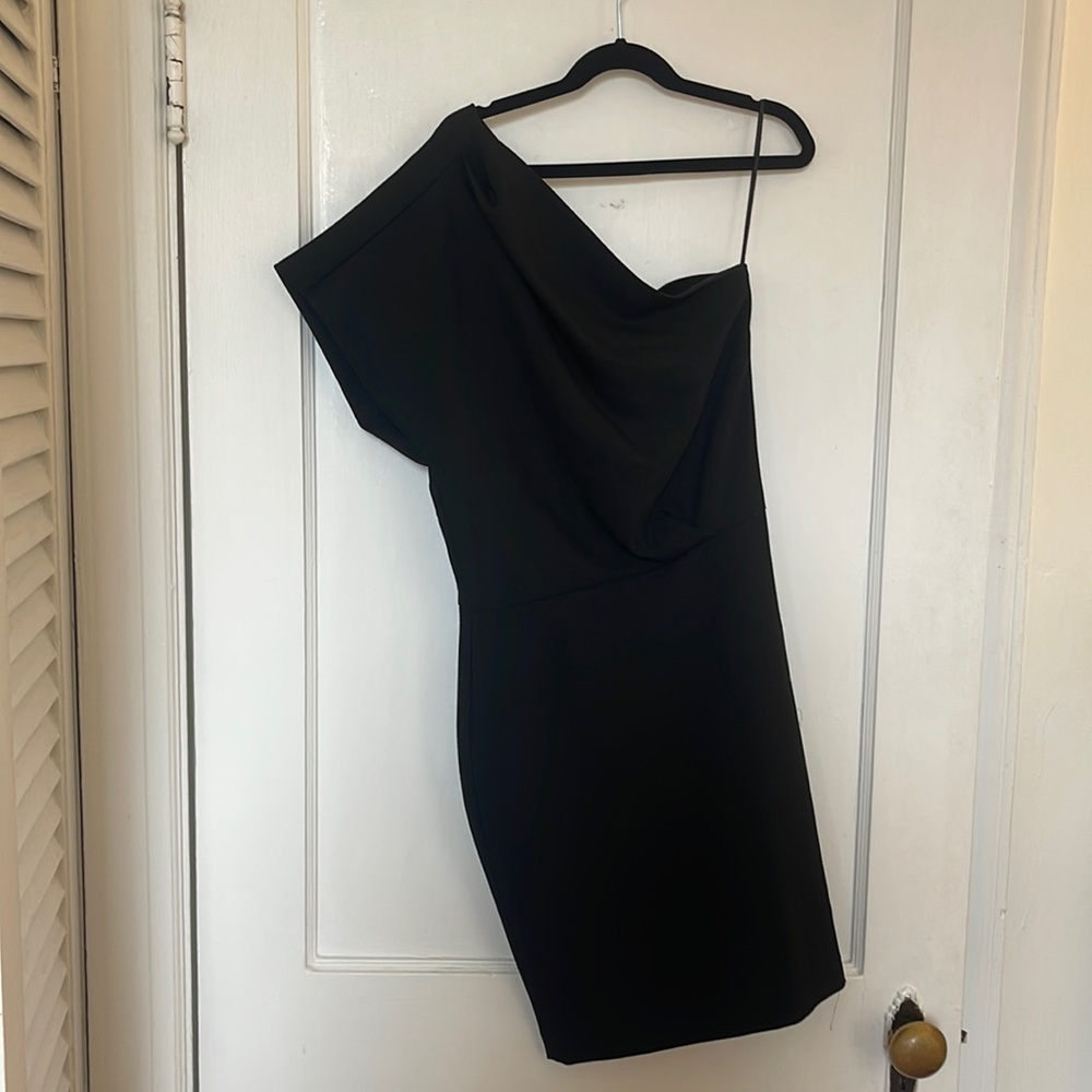 Maje one shoulder black dress in SIZE 1 which is equivalent to an XS.